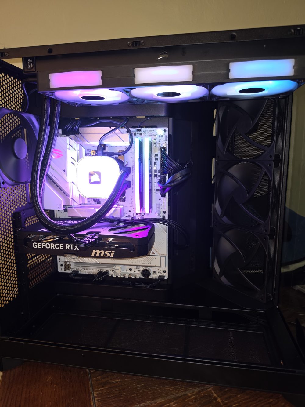 Ryzen 7 and RTX 5060 Ti gaming PC with liquid cooling and RGB lighting